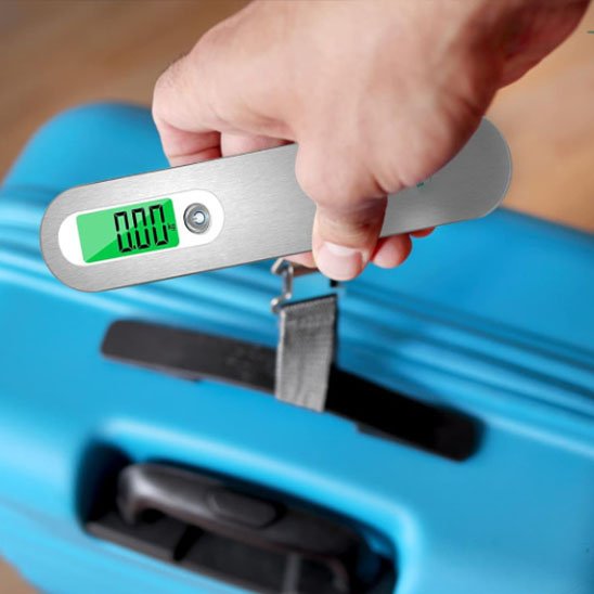 Pèse bagage sangle sur poignée de valise