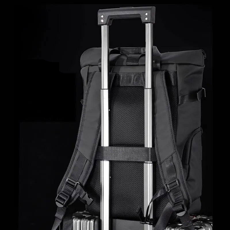 SAC A DOS VOYAGE permet de glisser le sac sur la poignee de sa valise